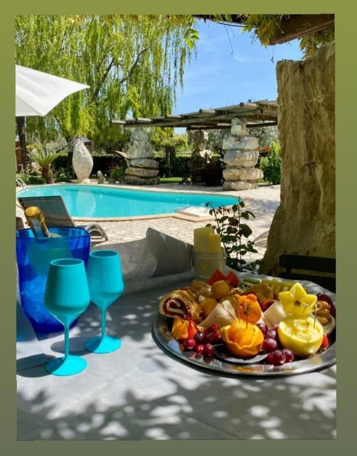 Il Giardino Dei Flintstones B&B Черветере Экстерьер фото
